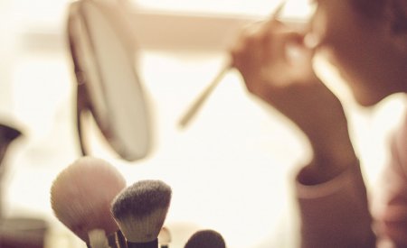 Woman putting make-up
