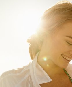 Bioderma - Woman protecting from the sun